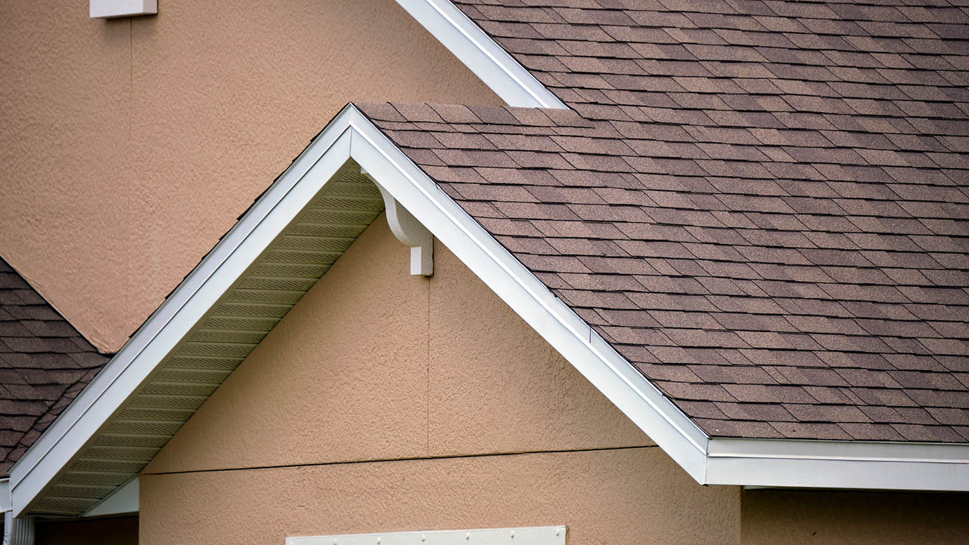 New asphalt shingle roof after professional replacement